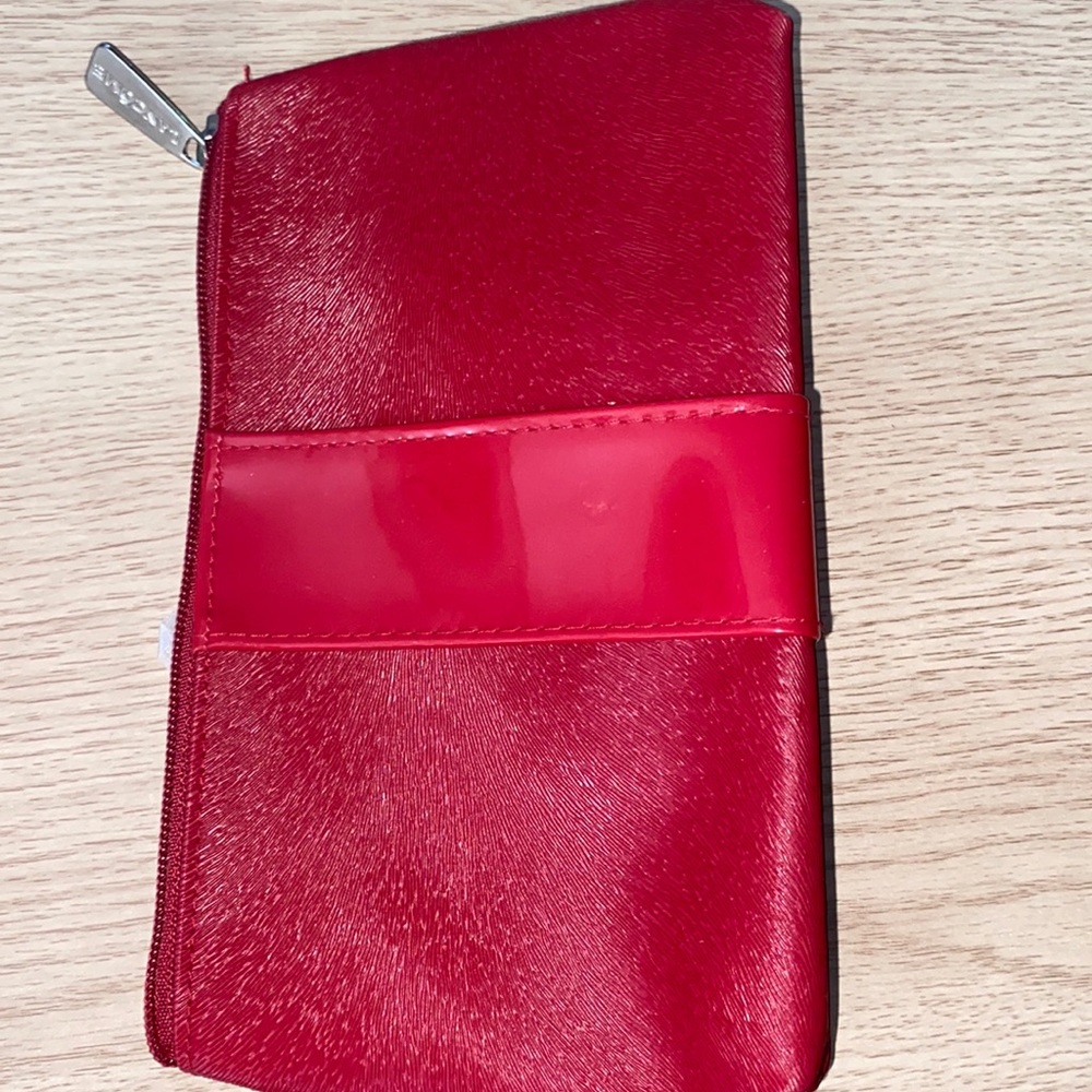 Red Lancôme small makeup bag. The perfect bag for ladies on the run